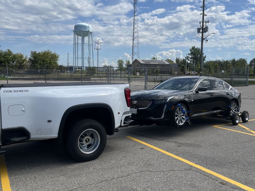 Bishopgate truck towing a luxury sedan